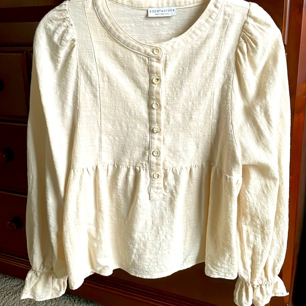 Beige peplum top size small.